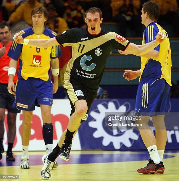 Holger Glandorf of Germany celebrates scoring a goal during the Men's Handball European Championship main round Group II match between Germany and...