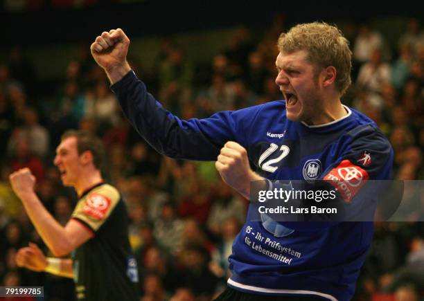 Goalkeeper Johannes Bitter of germany celebrates after a save next to Holger Glandorf during the Men's Handball European Championship main round...