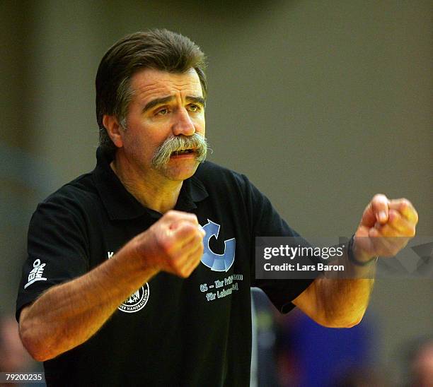Coach Heiner Brand of Germany celebrates during the Men's Handball European Championship main round Group II match between Germany and Sweden at...