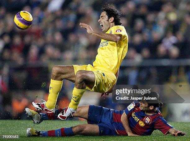 Rafael Marquez of Barcelona fauls Robert Pires of Villarreal during the Copa del Rey match between Villarreal and Barcelona at the El Madrigal...