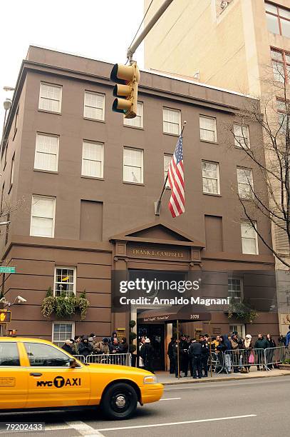 People stand outside the Frank E. Campbell Funeral Home where the body of recently deceased actor Heath Ledger was taken on the Upper East Side of...