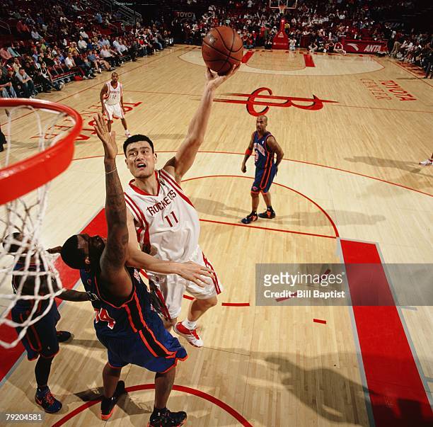 Yao Ming of the Houston Rockets shoots against the New York Knicks during the game at the Toyota Center on January 5, 2008 in Houston, Texas. The...