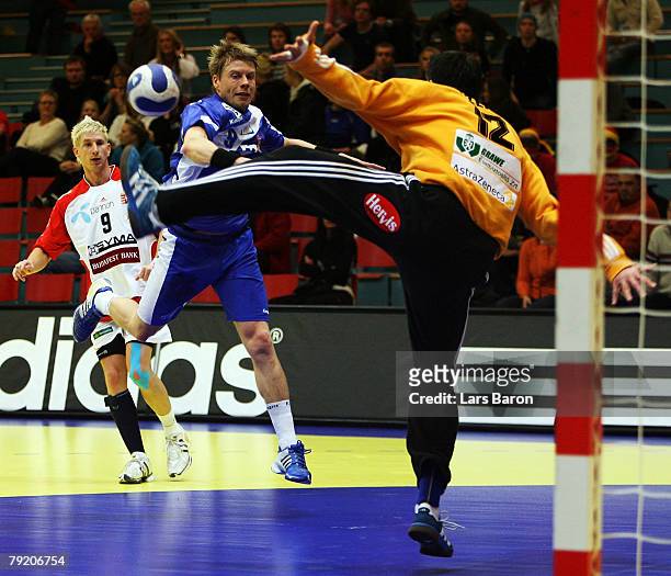 Gudjon Valur Sigurdsson of Iceland in action with Nandor Fazekas of Hungary during the Men's Handball European Championship main round Group II match...