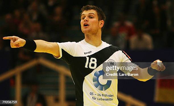 Michael Kraus of Germany gives instructions during the Men's Handball European Championship main round Group II match between Germany and France at...