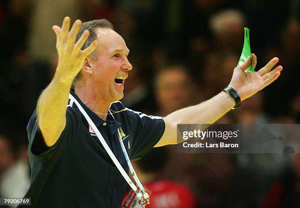 Coach Ingemar Linnell of Sweden celebrates after winning the Men's Handball European Championship main round Group II match between Spain and Sweden...