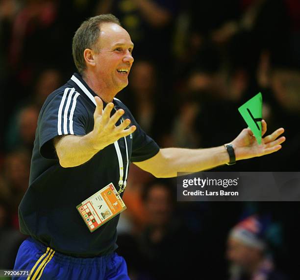 Coach Ingemar Linnell of Sweden celebrates after winning the Men's Handball European Championship main round Group II match between Spain and Sweden...