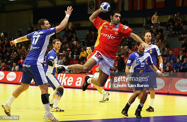 Ruben Garabaya of Spain in action with Sverre Jakobsson and Alexander Petersson of Iceland during the Men's Handball European Championship main round...