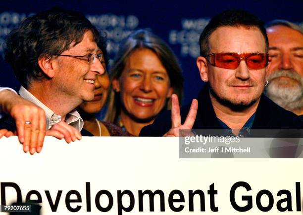 Bill Gates and Bono, attend a press conference during the third day of the World Economic Forum January 25, 2008 in Davos,Switzerland.Some of the...