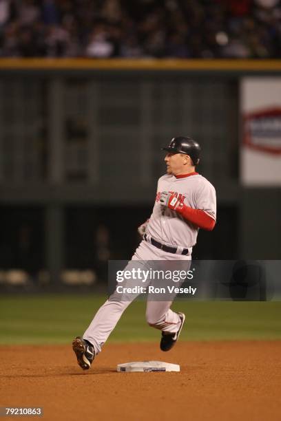 Drew of the Boston Red Sox runs during Game Three of the World Series against the Colorado Rockies at Coors Field in Denver, Colorado on October 27,...