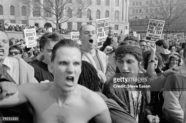 Protestors at a demonstration against the Poll Tax, which later became a riot known as the 'Battle of Trafalgar', London, 31st March 1990.