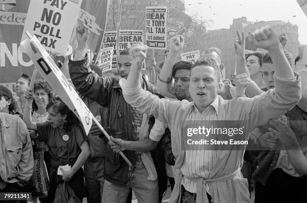 Protestors at a demonstration against the Poll Tax, which later became a riot known as the 'Battle of Trafalgar', London, 31st March 1990.