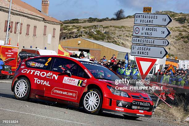 Spanish driver Dani Sordo steers his Citroen C4 WRC during the sixth stage of the Monte-Carlo Rally's 76th edition between Saint-Pierreville and...