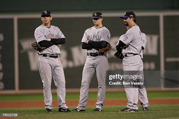 The Colorado Rockies infielders talk during Game Two of the World Series against the Boston Red Sox at Fenway Park in Boston, Massachusetts on...