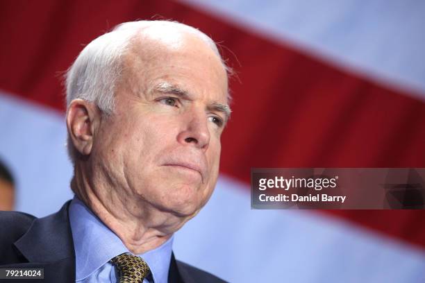 Republican presidential hopeful and Arizona Senator John McCain attends a national security roundtable during a campaign stop at the University of...