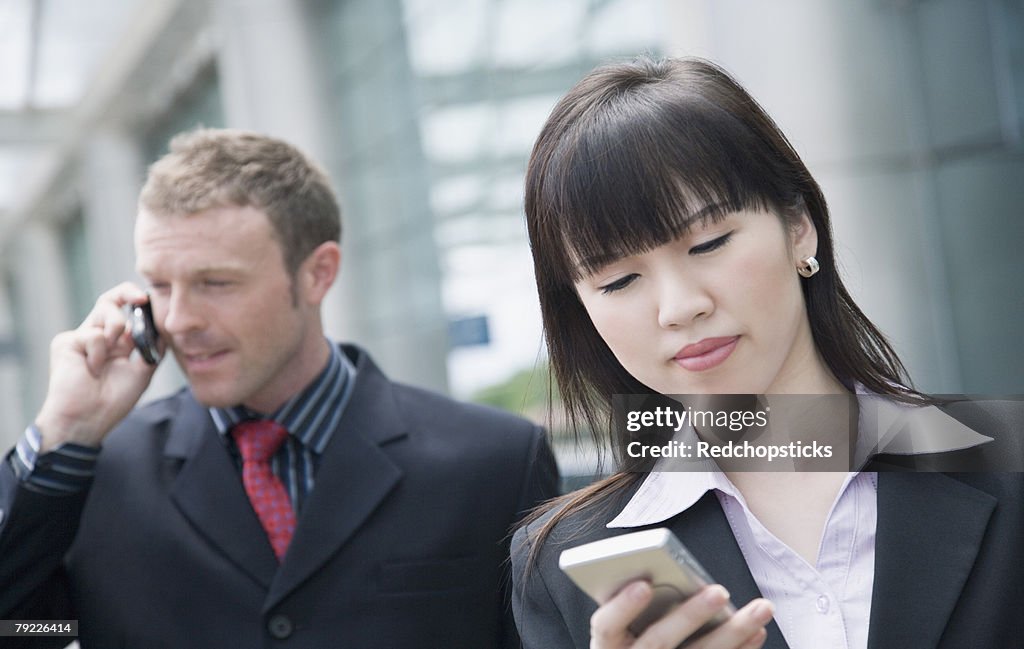 Personal Data Assistant Example Closeup Of A Businesswoman Using A Personal Data Assistant With A ...