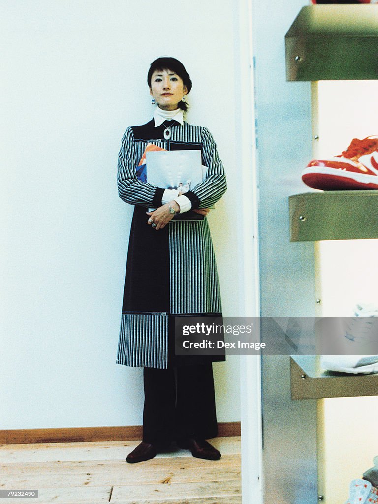 Young woman holding books