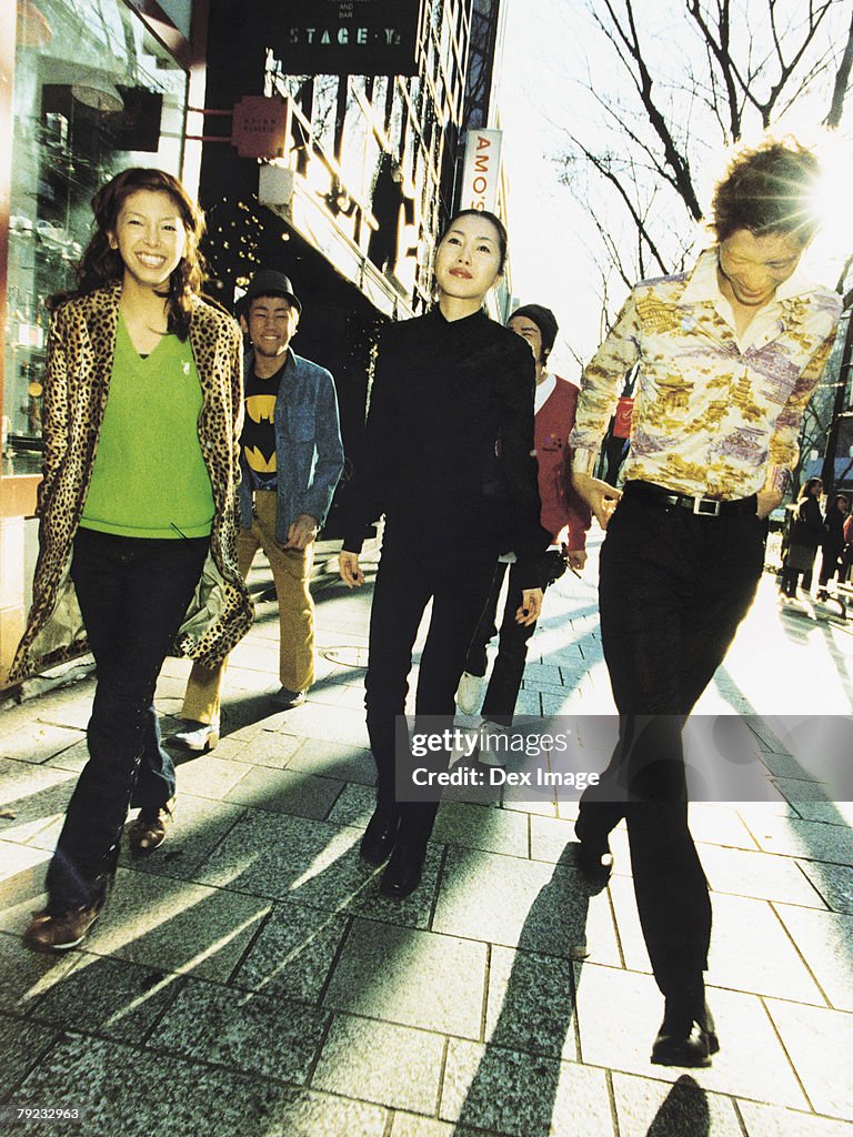 Group of Asian people walking on the street