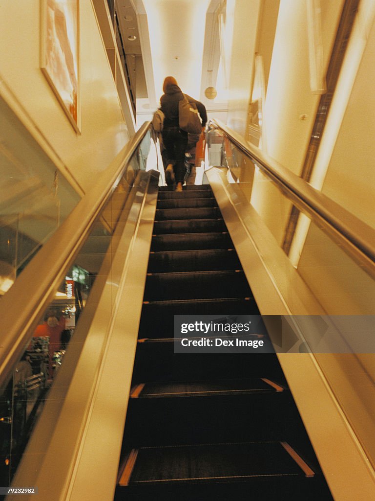 People on escalator