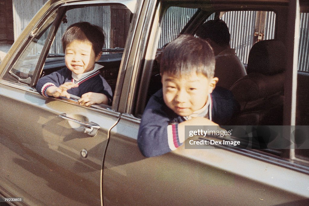 Two brothers in a car