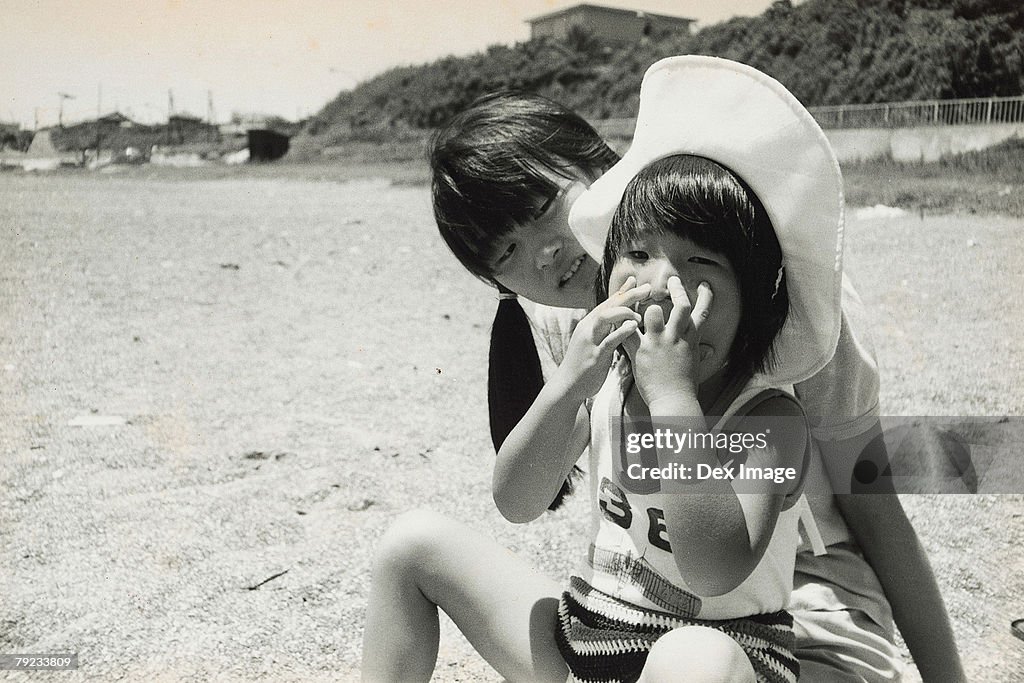 Two sisters on the beach