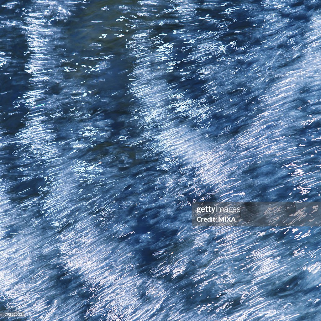 Water flowing rapidly in stream