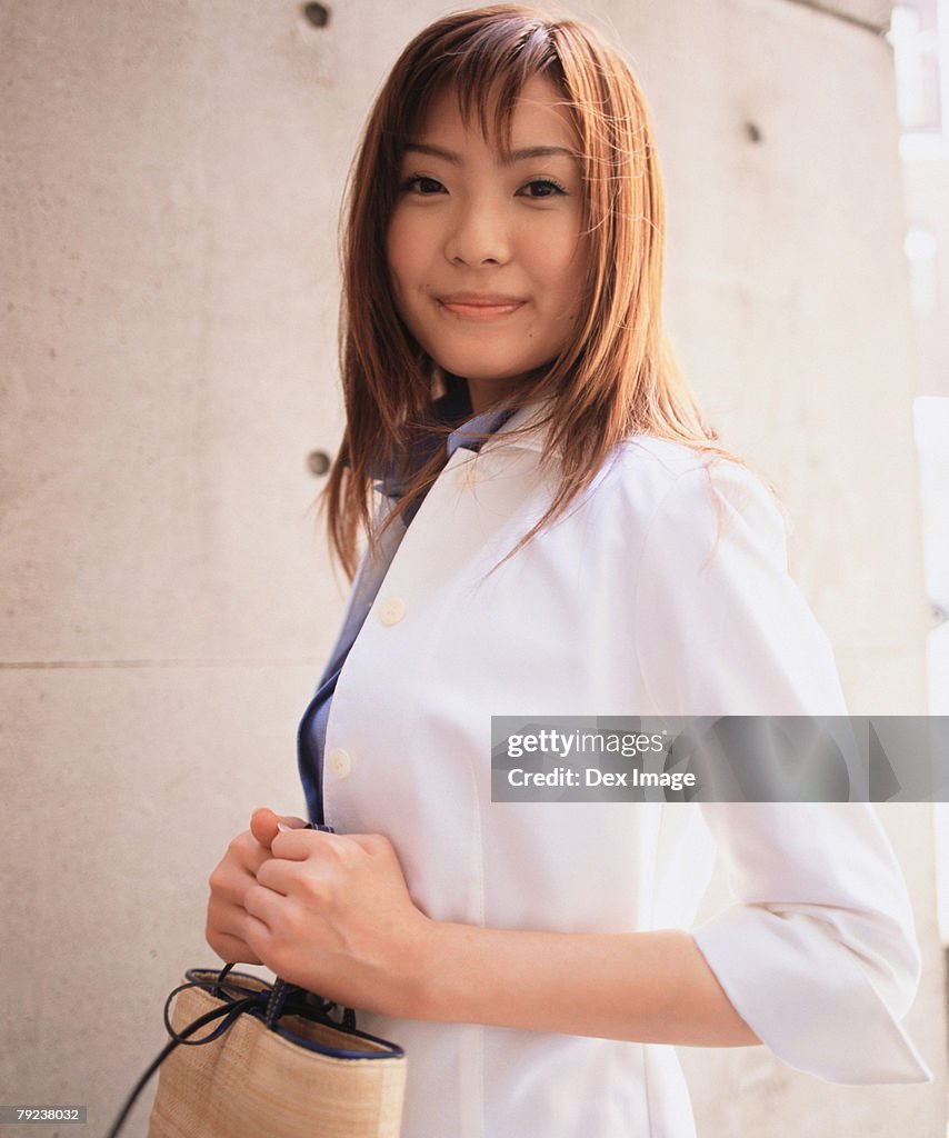 Portrait of a smiling woman, posing