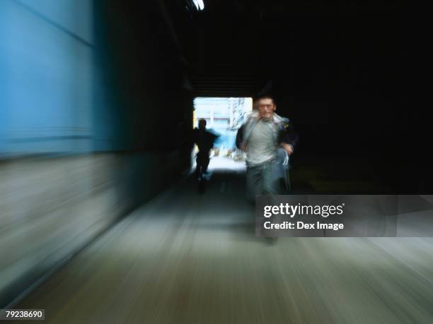 Chasing Men 19,764 Man Being Chased Stock Photos, High-Res Pictures, and Images ...