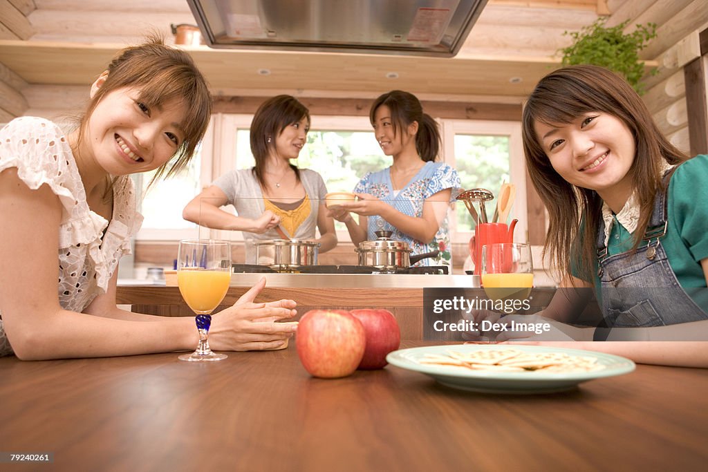 A group of girls in the kitchen