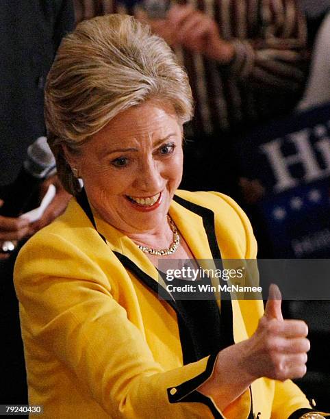 Democratic presidential candidate Sen. Hillary Clinton gestures to supporters while arriving for a campaign event at the Freedom Center January 25,...