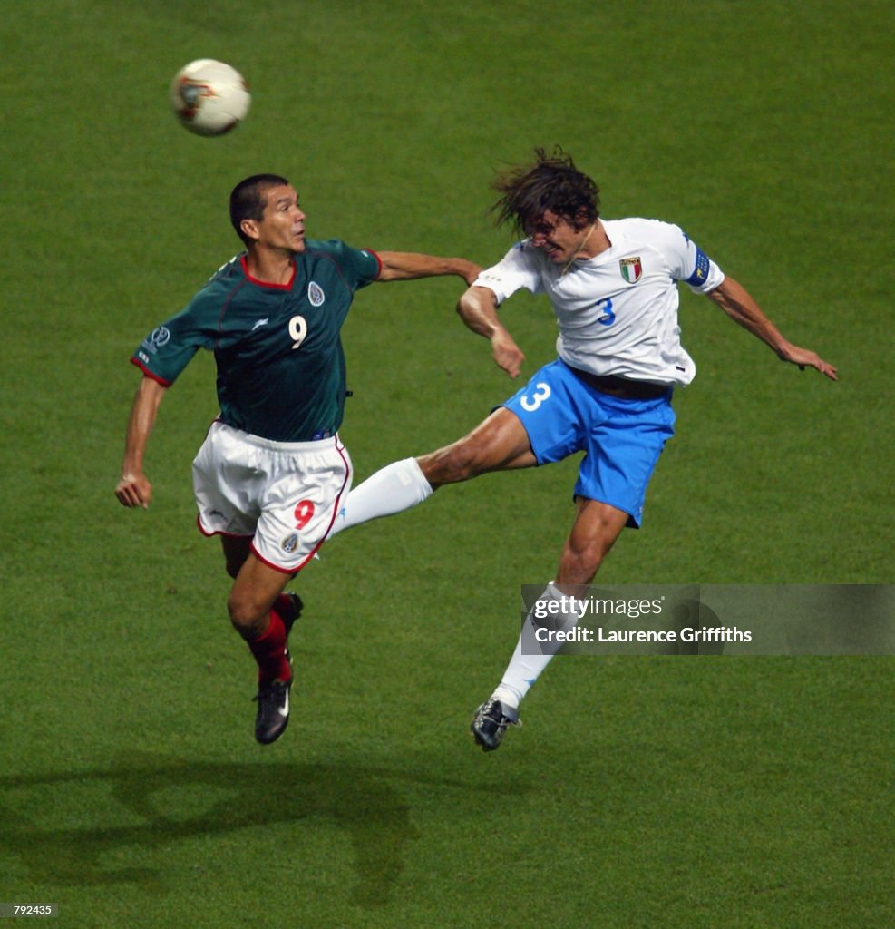 Paolo Maldini of Italy and Jared Borgetti of Mexico