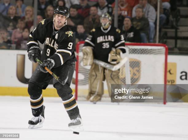 Mike Modano of the Dallas Stars looks to pass to a teammate against the Buffalo Sabres at the American Airlines Center on January 24, 2008 in Dallas,...