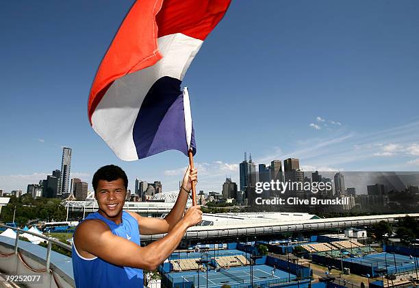 Jo-Wilfried Tsonga of France poses on top of Vodafone Arena on day thirteen of the Australian Open 2008 at Melbourne Park on January 26, 2008 in...