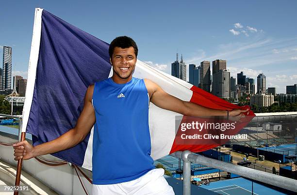 Jo-Wilfried Tsonga of France poses on top of Vodafone Arena on day thirteen of the Australian Open 2008 at Melbourne Park on January 26, 2008 in...