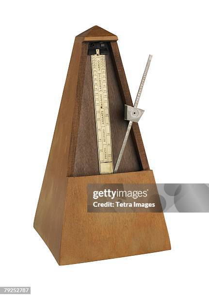 still life of a metronome - metronomo foto e immagini stock