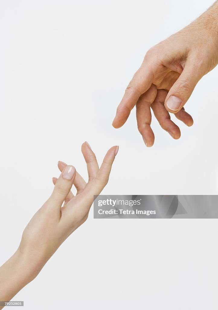 Touch Using Hand Two Hands About To Touch High-Res Stock Photo - Getty Images