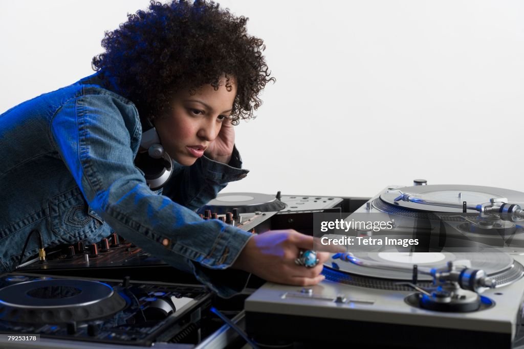 Woman working at a mixing board