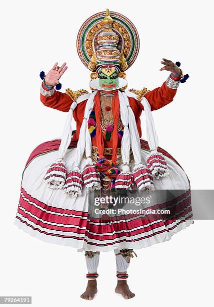 close-up of a kathakali dance performer dancing - kathakali stock pictures, royalty-free photos & images