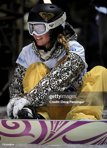 Torah Bright of Cooma, Australia straps on her board as she went on to finish second in the Women's Snowboard Superpipe at the Winter X Games Twelve...