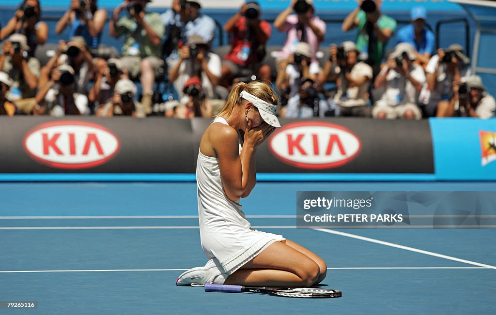 Tennis Ru Russian tennis player Maria Sharapova drops to her knees as she... News ...