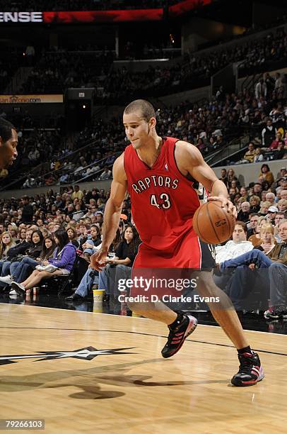 Kris Humphries of the Toronto Raptors dribbles the ball against the San Antonio Spurs during the game at the AT&T Center on December 28, 2007 in San...