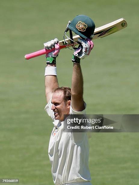 Matthew Hayden of Australia celebrates scoring his century during day three of the Fourth Test between Australia and India at Adelaide Oval January...