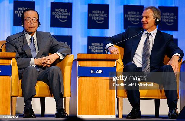 Yasuo Fukuda, Prime Minister of Japan, and former British Prime Minister and current UN Middle East envoy, Tony Blair, attend the fourth day of the...