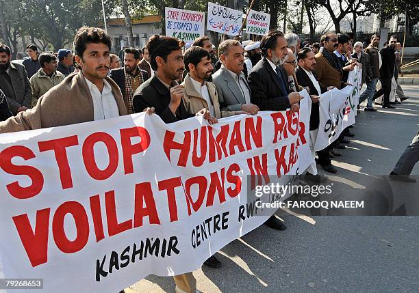 Pakistani Kashmiri protesters of political parties march towards the Indian embassy during a demonstration in Islamabad, 26 January 2008. The...