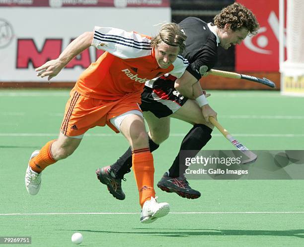 Roderick Wuesthof of Netherlands challenges Sebastian Biederlack of Germany during the Five Nations Mens Hockey tournament match between Netherlands...