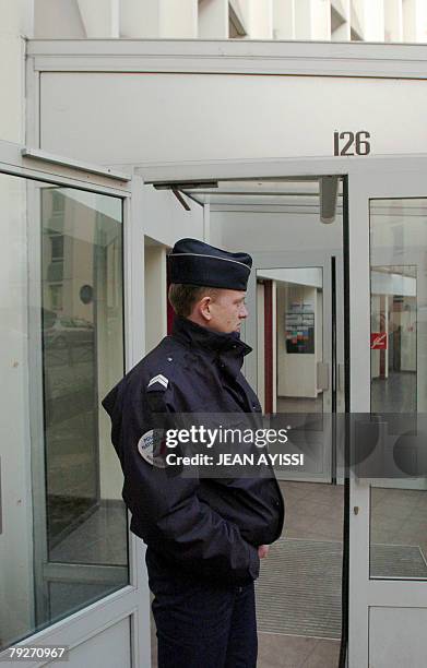 Policeman stands, 26 January 2008, in front of the headquarters of the Paris police's financial brigade where Jerome Kerviel, French trader Jerome...