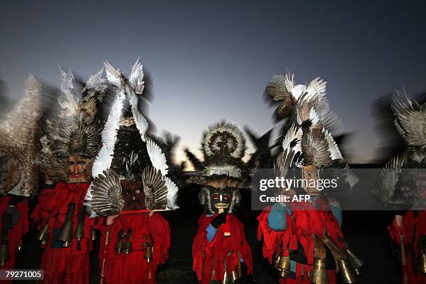 Bulgarian dancers known as a "kukeri" perform a ritual dance during the International Festival of the Masquerade Games in Pernik near Sofia, 26...