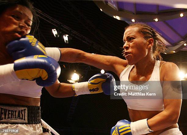 Cecilia Braekhus of Norway and Wanda Pena Ozuna of the Dominican Republic in action during the light welterweight at the Tempodrom on January 26,...