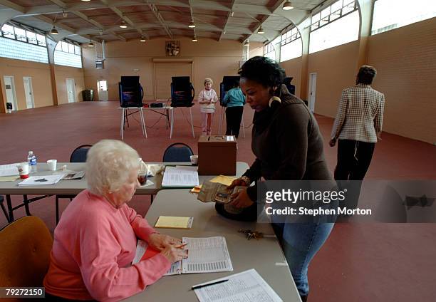 Voter Cynthia Williams prepares to cast her ballot at the City Civic Center January 26, 2008 in Bamberg, South Carolina. South Carolina holds its...