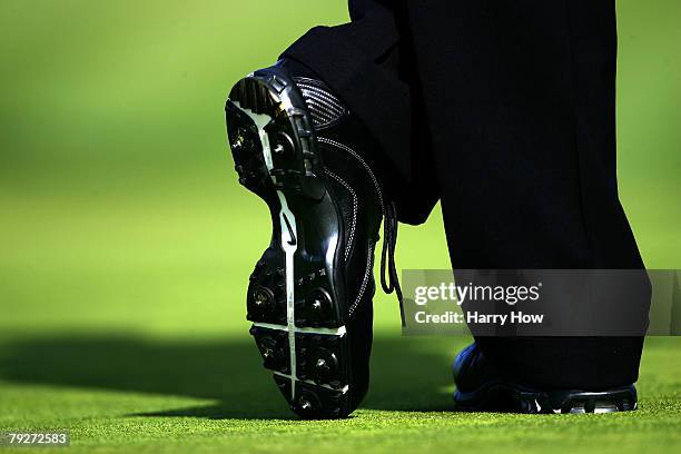 Tiger Woods waits to putt on the second hole during the third round of the Buick Invitational at the Torrey Pines Golf Course January 26, 2008 in La...