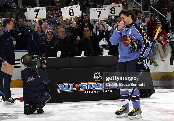 Eastern Conference All-Star Ilya Kovalchuk of the Atlanta Thrashers reacts after the judges show his scores during the Dodge/NHL SuperSkills...